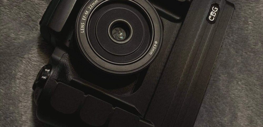 Our Extended Battery Grip for Canon EOS M50 with orange cold shoe